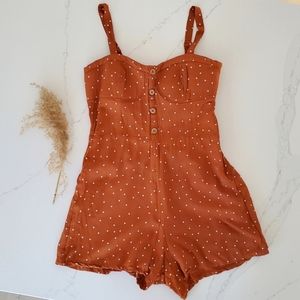 Twik M burnt orange polka-dot romper